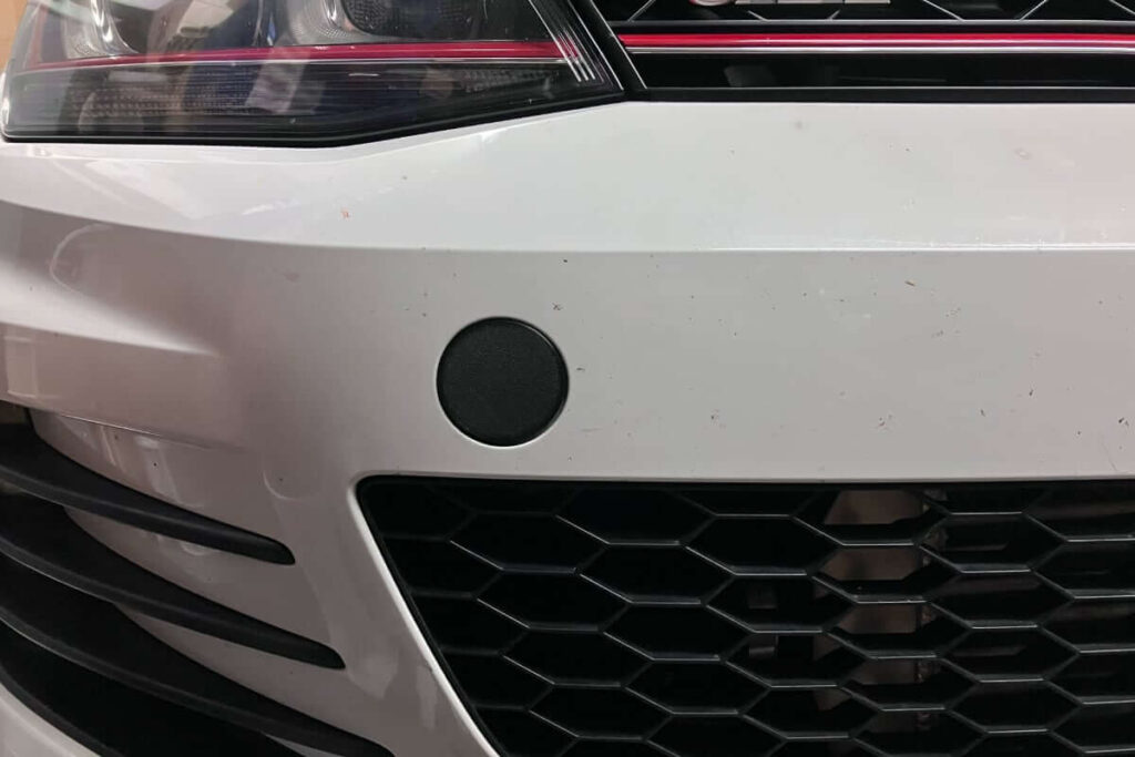 Mk7 GTI Tow Hook Cover Installed