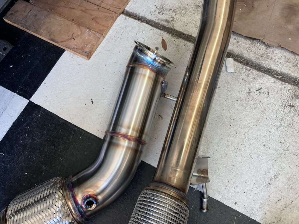 CC Design (L) and Trackslag (R) Downpipes