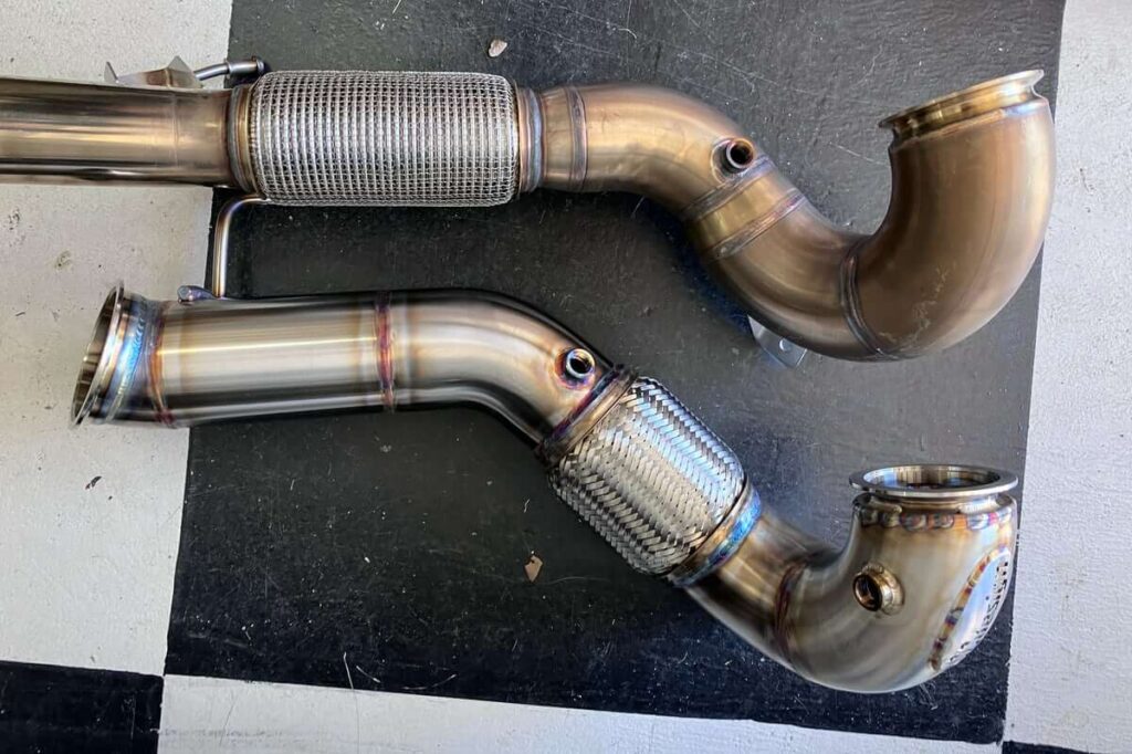 CC Design (Bottom) and Trackslag (Top) Downpipes